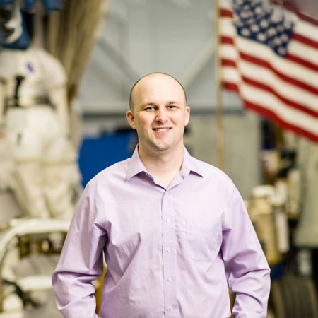 Caleb Mims portrait with American flag in background