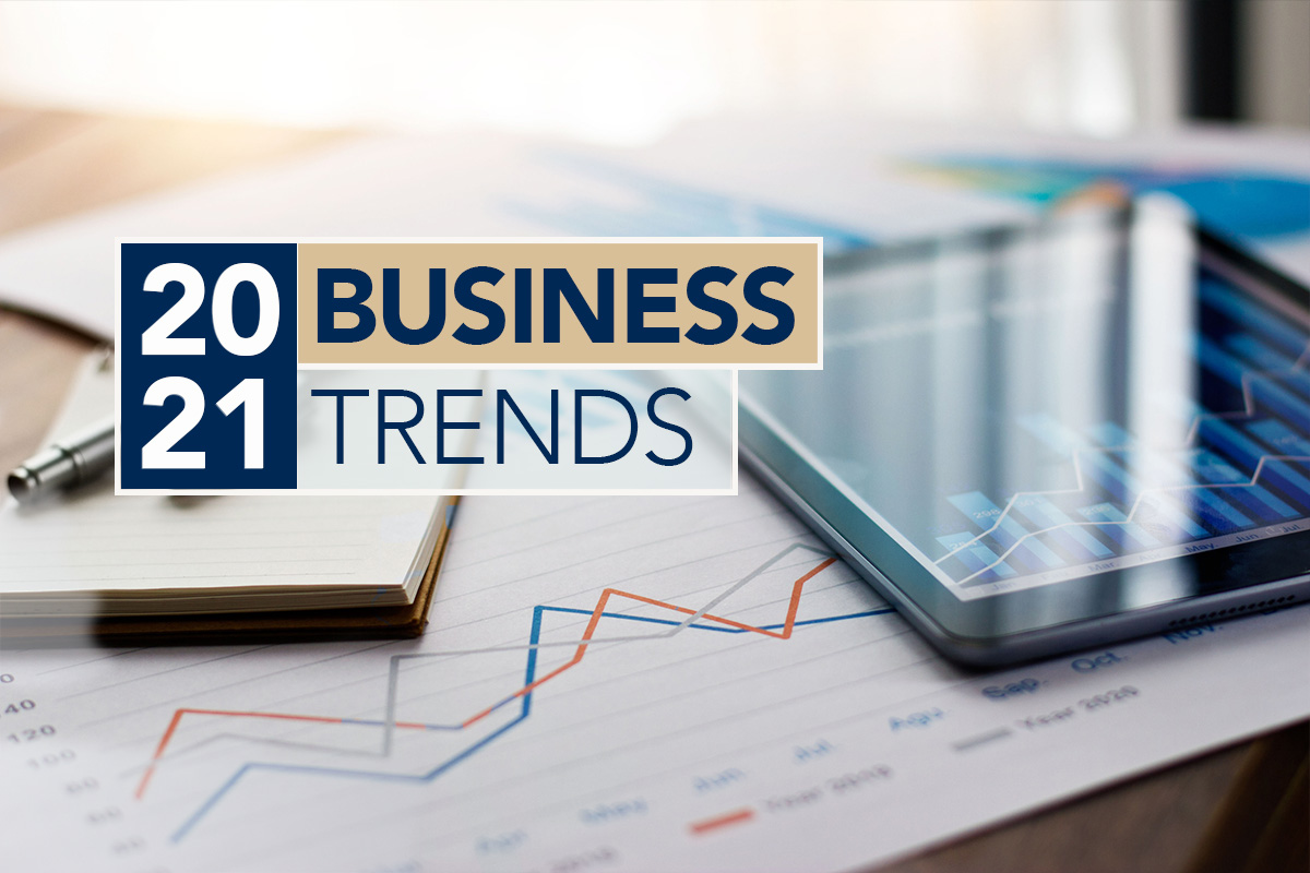 2021 business trends graphic featuring a tablet, notepad and pen