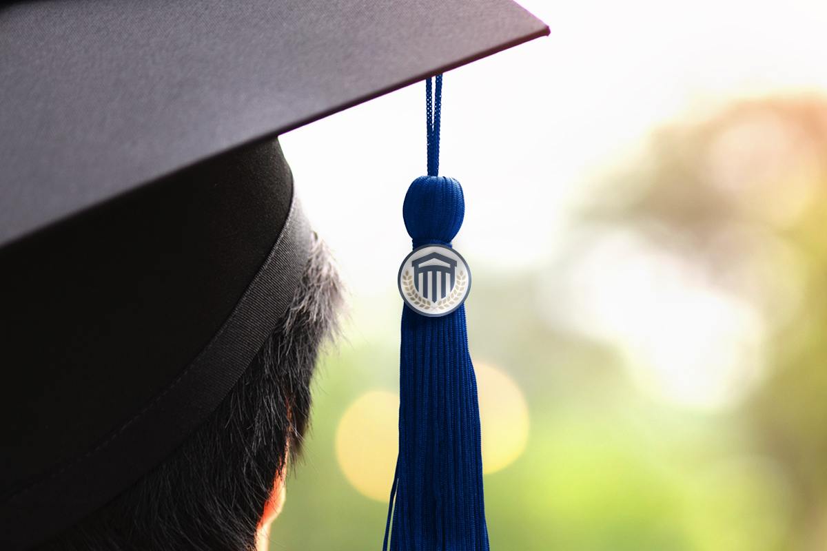 Close up of a CSU branded tassel hanging from a graduation cap