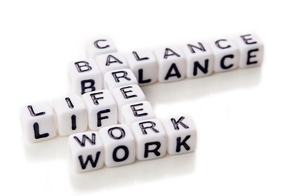 Alphabet beads lined up to spell career, work, life and balance.