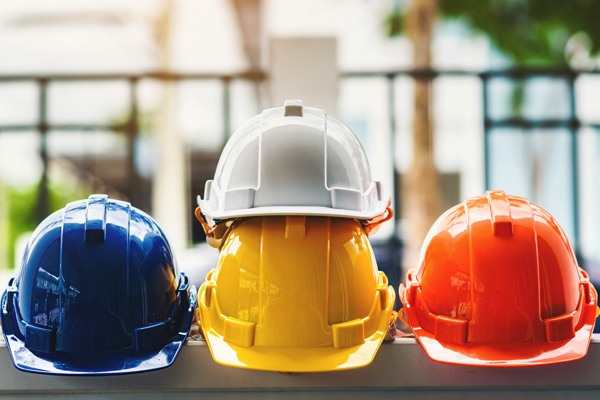 A colorful stack of hard hats.
