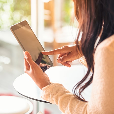 women using a tablet